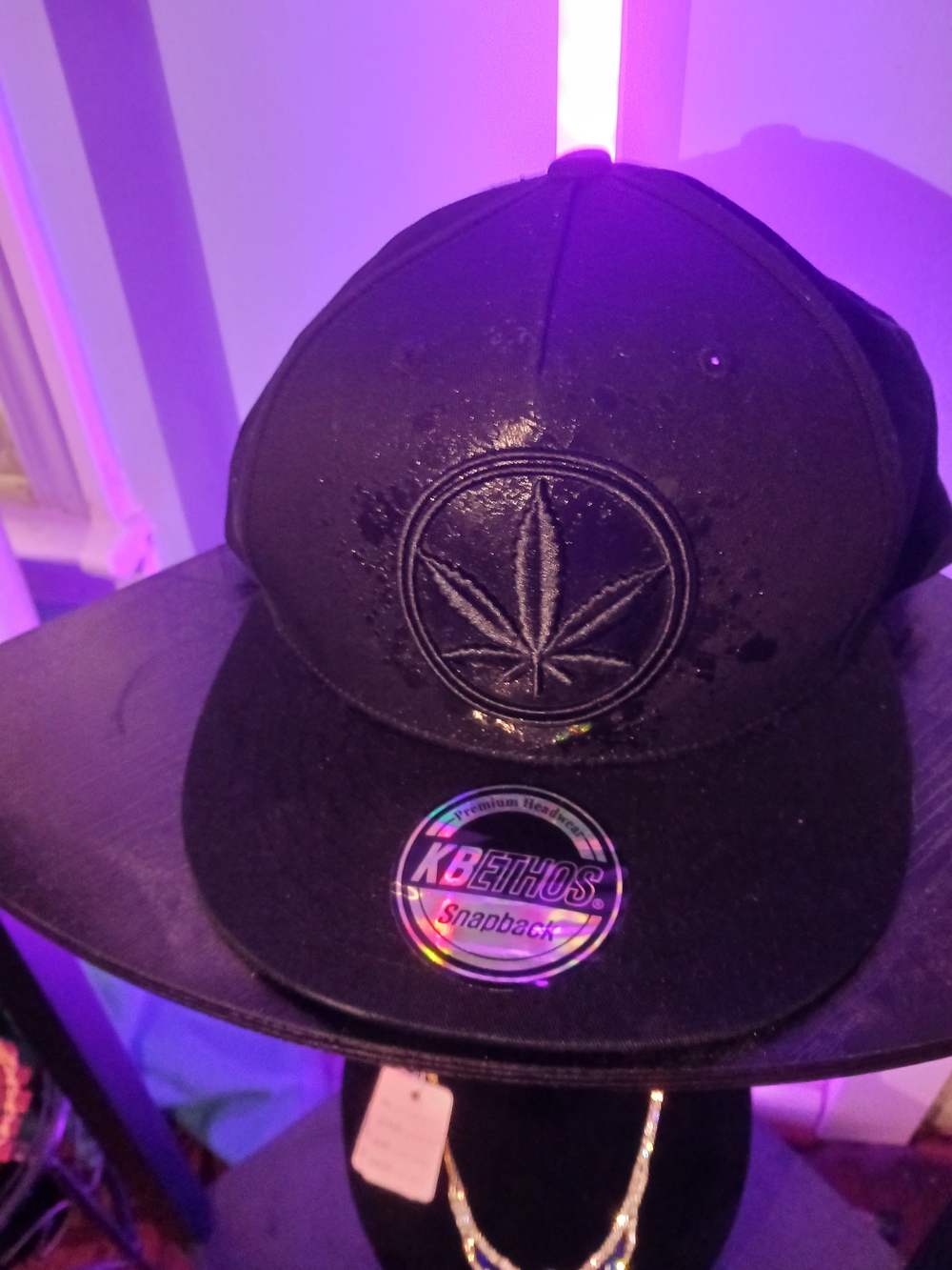 KBETHOS Black Snapback Hat with Embroidered Leaf